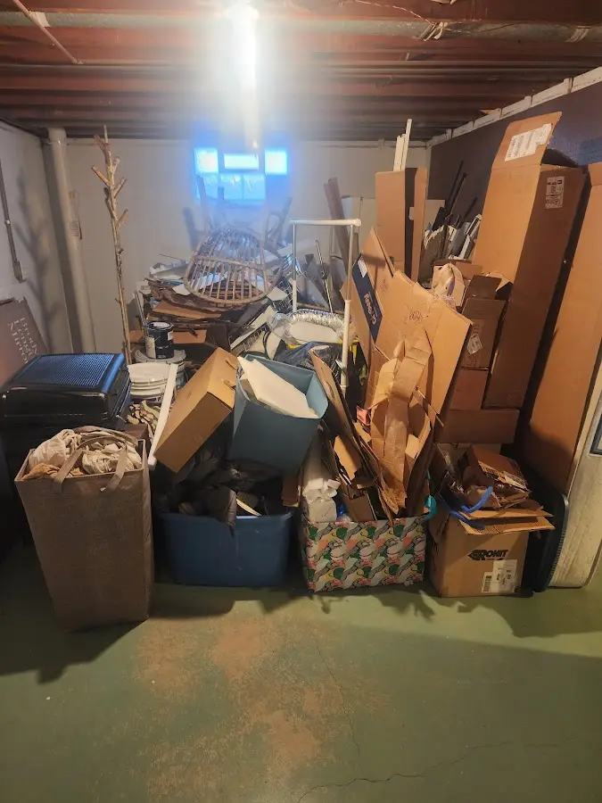 Roll-off dumpster container at job site for Yard Waste Dumpster Rental in Clarksburg